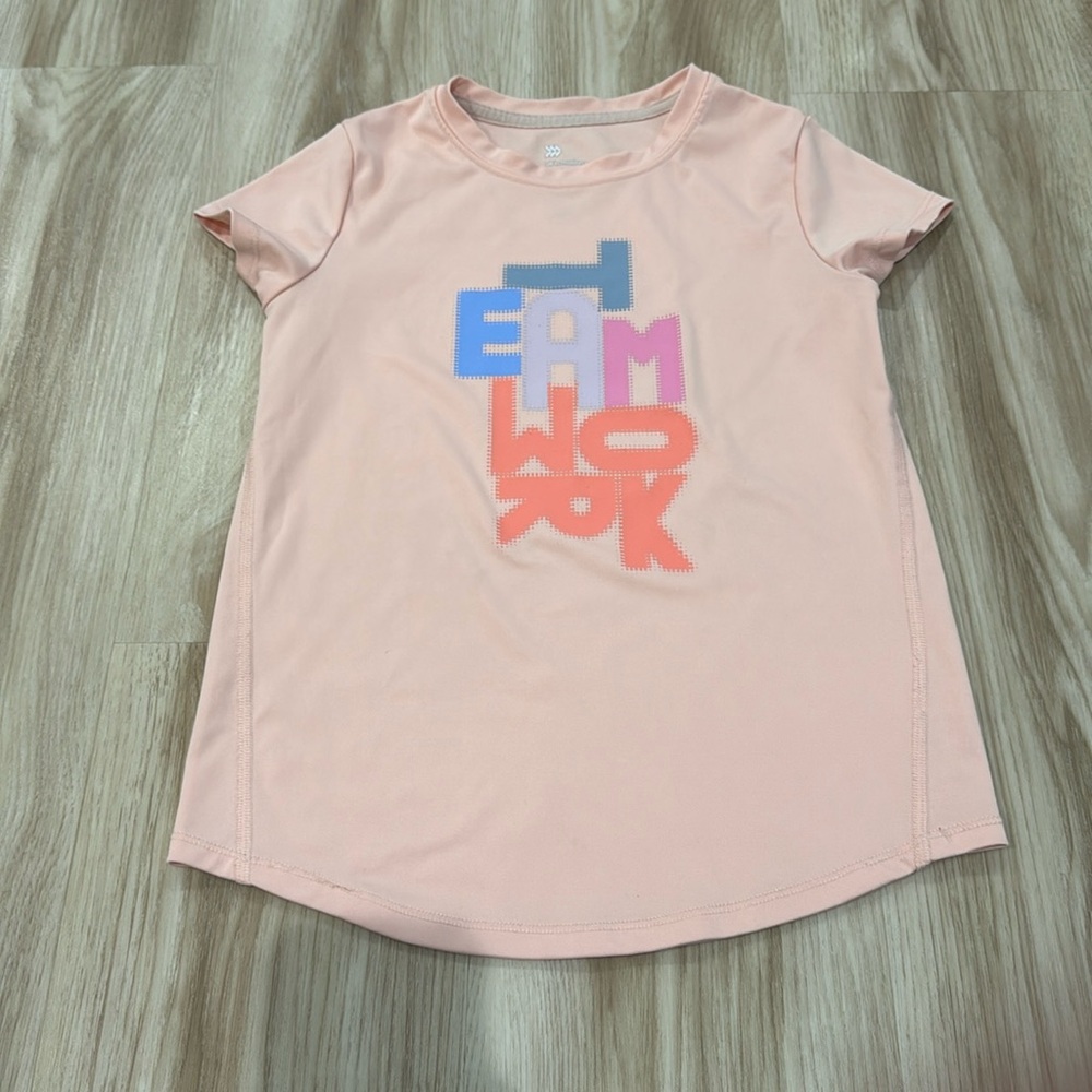 Girls all in motion size 7/8 light pink teamwork tshirt